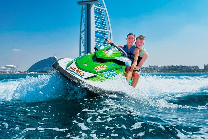 30-Min Jet Ski Tour: English Breakfast, Burj Al Arab View Bliss - Following the guide to Burj Al Arab