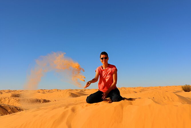 4 Hour Morning Desert Safari with Camel Ride & Sand Boarding - Sandboarding on the red dunes