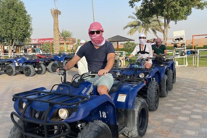 4 Hours Desert Tour with Quad Bike Camel Ride & Sandboard - The 30-minute 4x4 dune-bashing ride