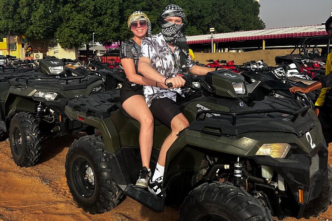 4 Hours Desert Tour with Quad Bike Camel Ride & Sandboard - A 15-minute camel ride
