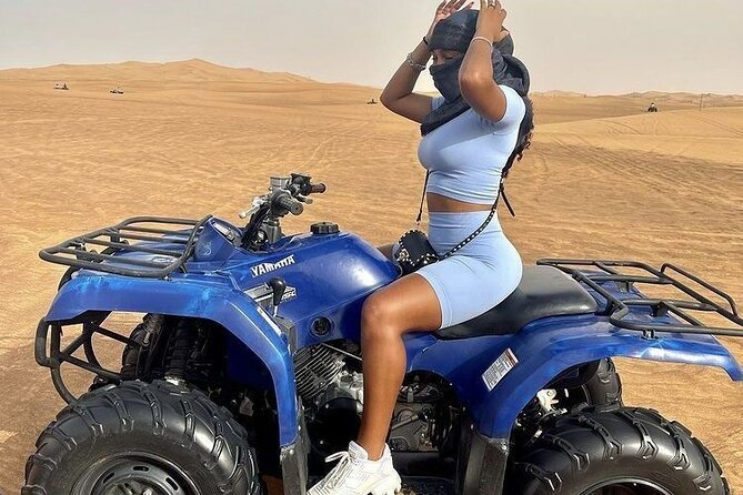 4 Hours Desert Tour with Quad Bike Camel Ride & Sandboard - Guides, safety, and the human side