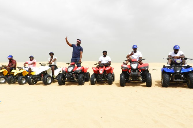 4x4 ATV Quad Biking Dubai Desert Tour - 1 Hour Experience - Following the guide across the dunes