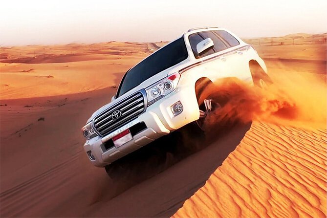 6-Hour Dubai Desert Dinner Safari with Dune Bashing & Camel Ride - Leaving Dubai for the open desert