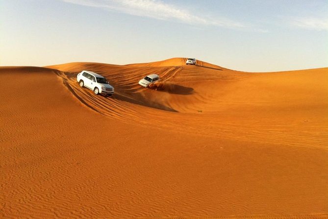Abu Dhabi 4x4 Desert Safari BBQ Dinner , Camel Ride , Belly Dance - Sunset photographs before camp