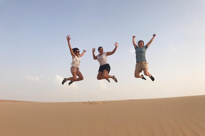 Abu Dhabi: 7-Hours Desert Safari with BBQ, Camel Ride & Sandboarding - Dune bashing with a skilled driver
