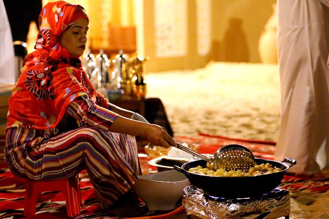 Abu Dhabi Afternoon Desert Safari and BBQ Dinner - Belly Dance, Tannoura, and Traditional Dress