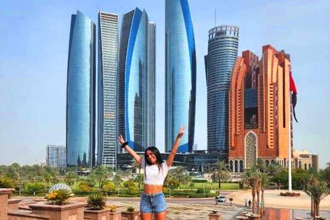 Abu Dhabi City Tour: Grand Mosque, Palace, Souk, Louvre & Ferrari - Emirates Palace and Qasr Al Watan