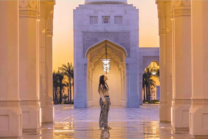 Abu Dhabi City Tour: Grand Mosque, Palace, Souk, Louvre & Ferrari - Yas Mall, Etihad Towers, and the practical middle of the day