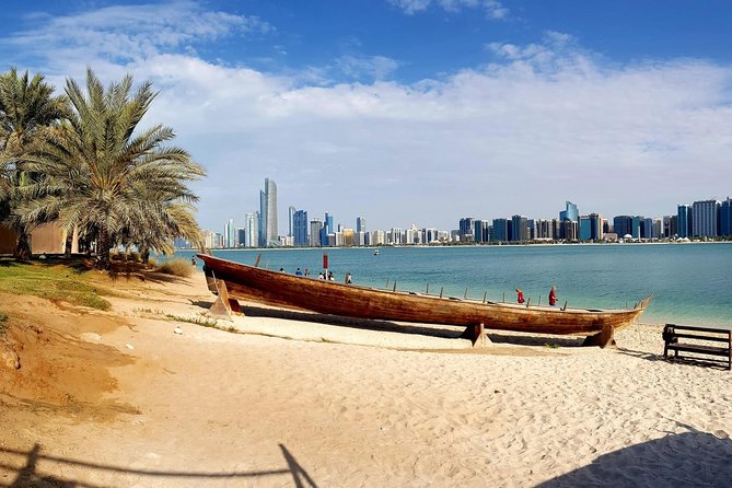 Abu Dhabi City Tour with Louvre Museum from Dubai Small Group - Emirates Palace and Al Bateen: grand views from the vehicle