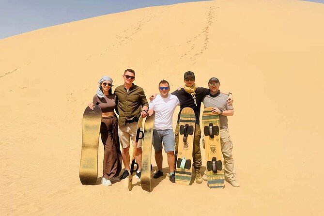 Abu Dhabi Desert Safari: Live Shows, Camel Rides & BBQ Buffet - Three live shows after dark