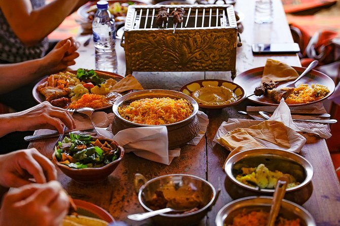 Abu Dhabi: Desert Safari with BBQ, Camel Ride & Sandboarding - BBQ dinner and stage shows finish the night