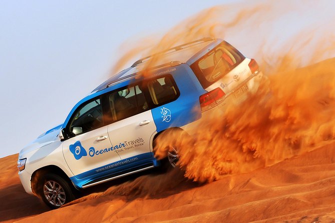 Abu Dhabi: Desert Safari with BBQ, Camel Ride & Sandboarding - The camel farm gives the afternoon a gentler start