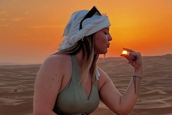 Abu Dhabi Desert Safari with Live Entertainment and Live BBQ - Camel riding, sandboarding, and the Bedouin-style camp