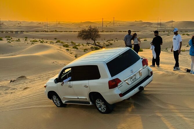 Abu Dhabi Desert Safari with Live Entertainment and Live BBQ - Belly dancing, fire, and Tanura performances