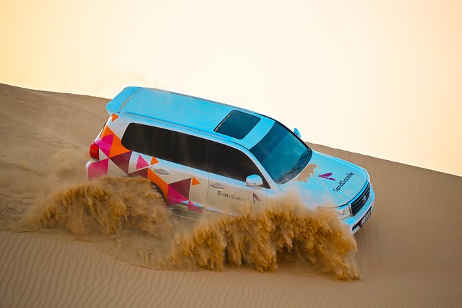 Abu Dhabi Evening Desert Safari - Dune bashing Camel ride and BBQ - Camp activities, from henna to quad bikes