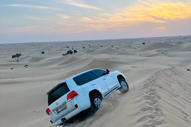 Abu Dhabi: Evening Desert Safari with Camel Ride, BBQ & Live Show - Leaving Abu Dhabi for Al Khatim Desert
