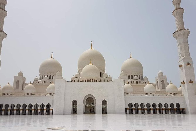 Abu Dhabi Full Day City with Grand Mosque Visit , Ferrari World Stop - Heritage Village and the Dates Market