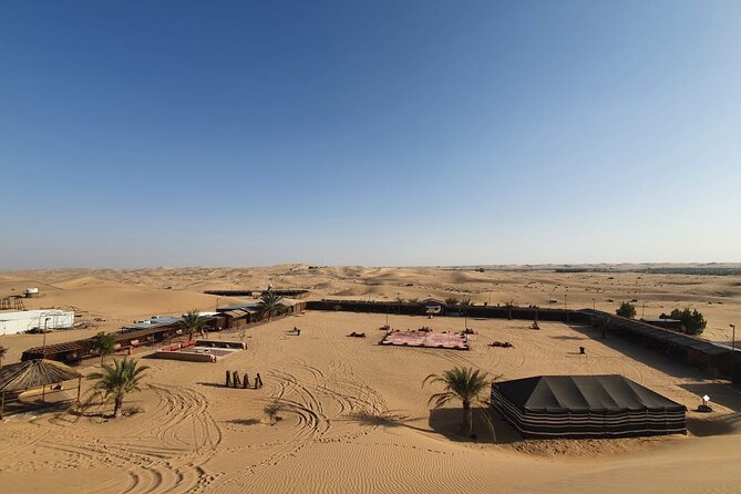 Abu Dhabi Half Day Desert Safari - Sandboarding and the sunset pause