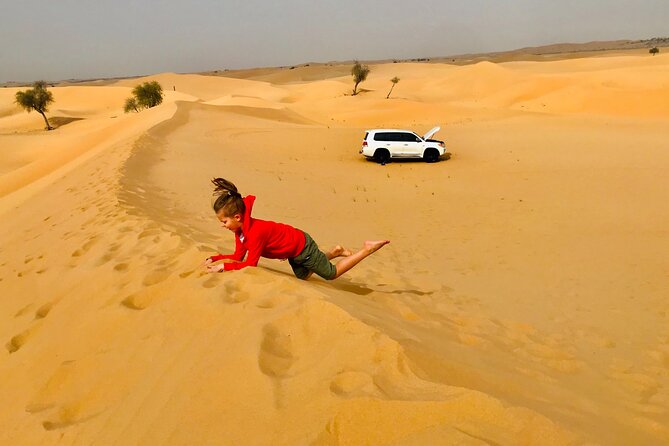 Abu Dhabi Morning Desert Safari,Dune Bashing,Sandboarding,Camel Riding&Quad Bike - Ten minutes on a quad bike