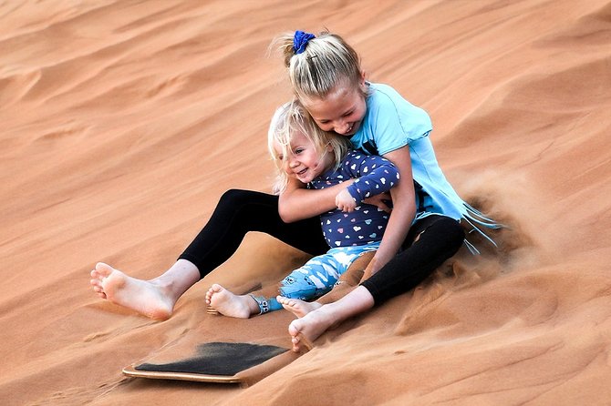 Abu Dhabi: Morning Desert Safari with Camels and Sandboarding - The camel ride is brief but worthwhile