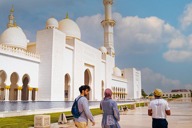 Abu Dhabi Sightseeing Tour: Sheikh Zayed Mosque, Heritage Village & Dates Market - Palace views from the coach