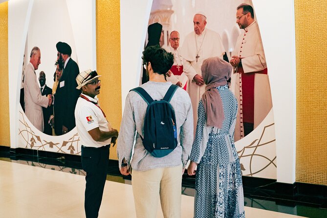 Abu Dhabi Sightseeing Tour: Sheikh Zayed Mosque, Heritage Village & Dates Market - Entering Sheikh Zayed Grand Mosque