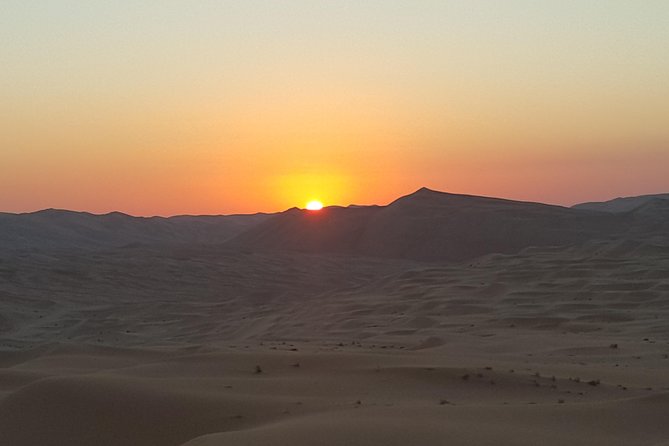 Abu Dhabi: Sunrise Desert Safari Experience - Watching the sun rise over the dunes