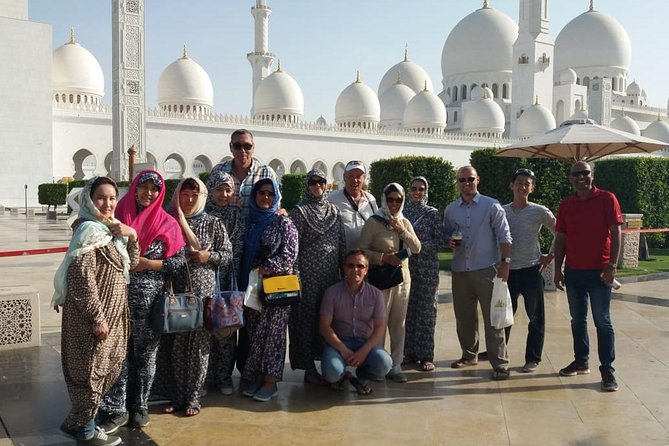 Abu Dhabi tour from Dubai small group with guide, Grand Mosque - Heritage Village shows a recreated pre-oil Abu Dhabi