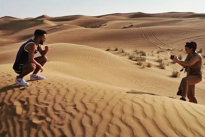 Afternoon Desert Safari with Quad Bike, Camel Ride and Sandboarding - Red dunes, open sky, and a four-hour afternoon