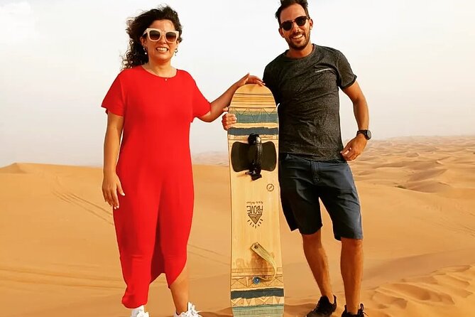 Afternoon Desert Safari with Quad Bike, Camel Ride and Sandboarding - Dune bashing across the high red dunes