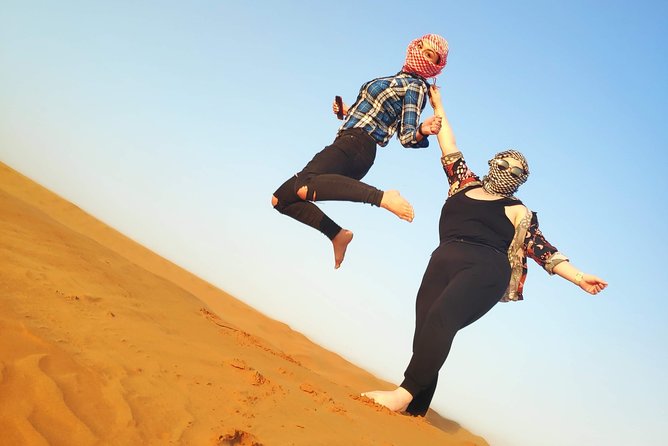 Afternoon Dune Drive Safari with SunSet Photo & Sand Boarding - Sandboarding is simple, free, and worth trying