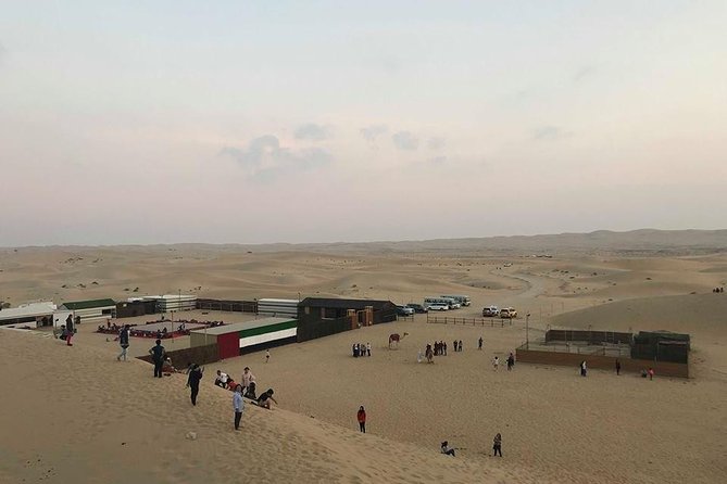Al Ain Desert Safari with Buffet Dinner - Fire and belly dance shows after sunset