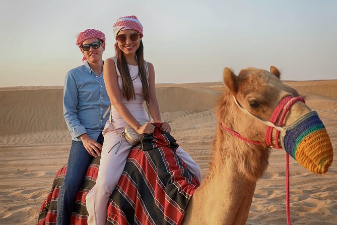 Al Marmoom Oasis Experience with Bedouin Dinner - Traditional clothing, henna, and the falcon encounter