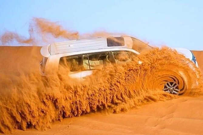 Arabian Candlelit : Private BBQ & Dune Bashing Getaway - Sandboarding adds a simple, hands-on stop