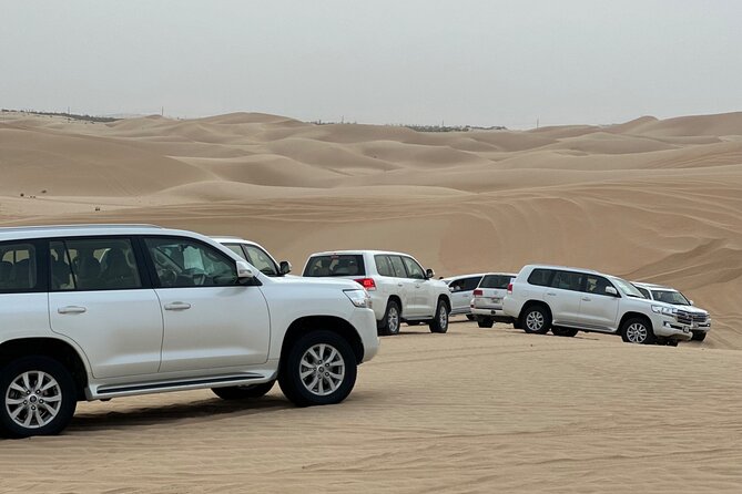 Arabian Desert Safari Abu Dhabi: 6Hour Tour with BBQ & Live Shows - The desert begins with a long pickup window