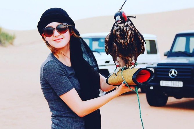 Arabian Desert Safari with BBQ Dinner Camel Ride, Sand Boarding - The Big Red Dunes set the tone