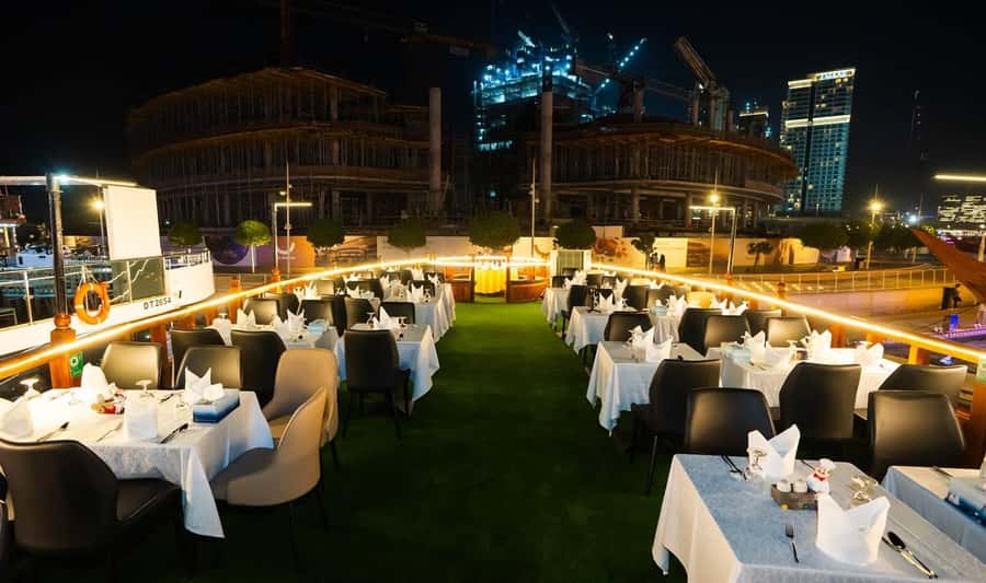 Best 5-Star Dhow Dinner Cruise Dubai Marina Jack Sparrow - Dubai Marina after dark, seen from a dhow