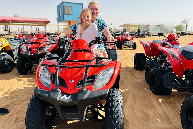 Best Dubai Desert Safari with Buffet Dinner,Sand Boarding & Shows - Quad biking: fun, but check what you are buying