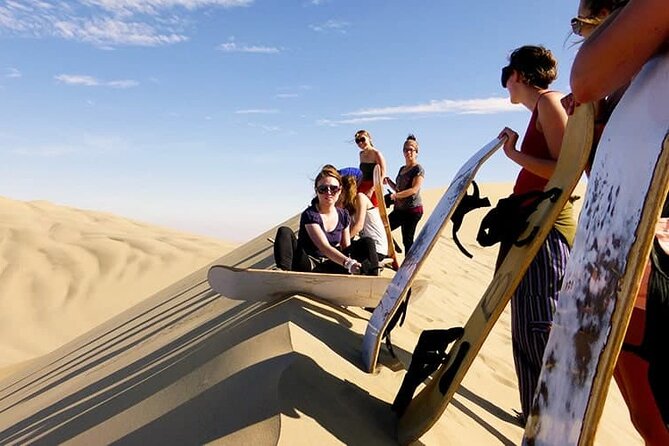 Camel Trekking Dubai with Dune Bashing and Sand Boarding - Heat, drinks, and what to bring