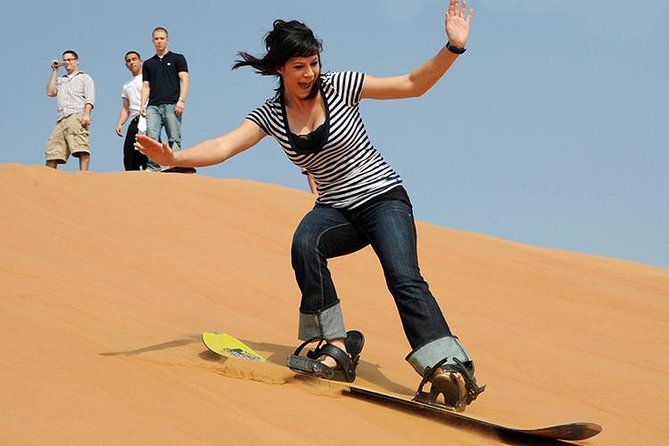 Combo Tour - Dubai Desert Safari and Dhow Cruise Dinner - Cruising Dubai Creek on a wooden dhow