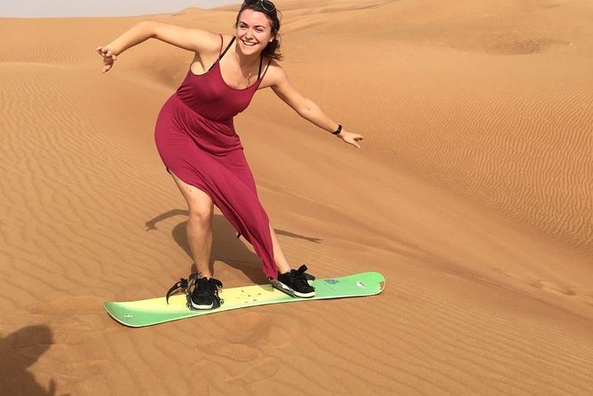 DEAL: Sheikh Zayed Grand Mosque and Dubai Red Dunes with BBQ Dinner - Guides, vehicles, and the human side of the tour