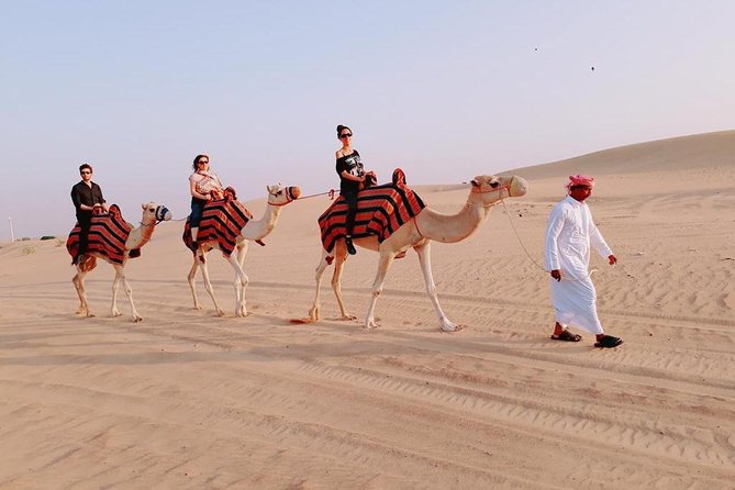 DEAL: Sheikh Zayed Grand Mosque and Dubai Red Dunes with BBQ Dinner - Dress for the mosque before you leave Dubai