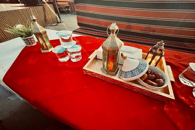 Deluxe Sunset Desert Safari: SandSurfing, Camel Ride & BBQ dinner - Arabic coffee, dates, luqaimat, and henna