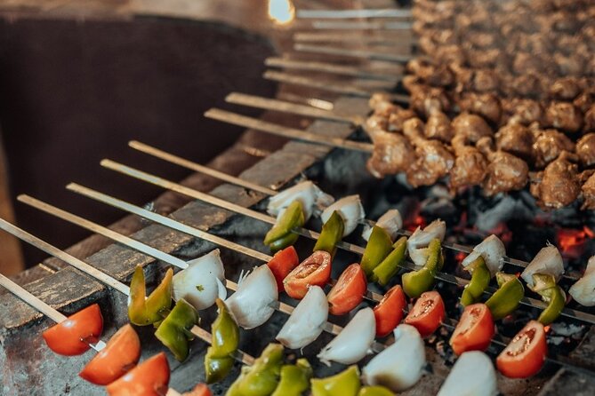 Deluxe Sunset Desert Safari: SandSurfing, Camel Ride & BBQ dinner - A waiter-served buffet and live BBQ
