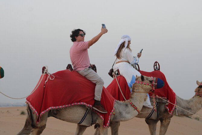 Desert Adventure: Sunset Safari, BBQ Feast & Sandboarding Thrill - BBQ dinner and three evening shows
