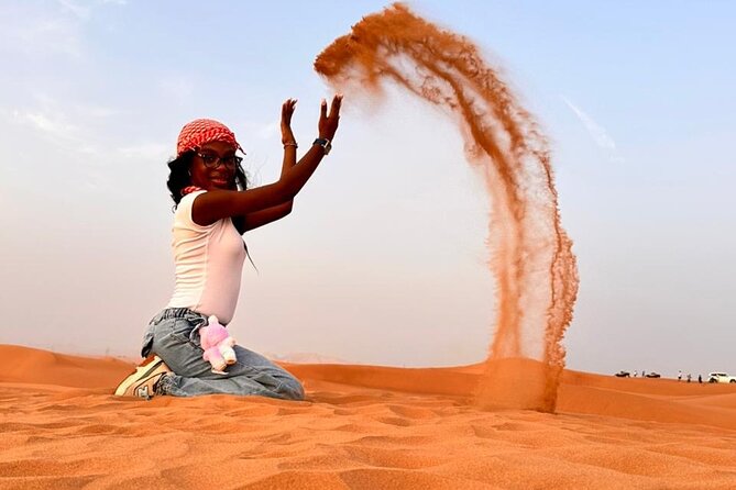 Desert Safari Adventure Dubai - Camel rides, sandboarding, and desert photos