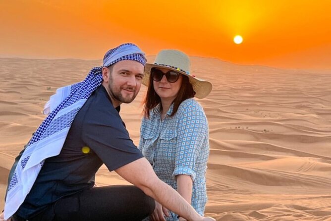 Desert Safari BBQ dinner, Camel ride & sandboarding from Dubai - Dinner and shows turn the outing into an evening event