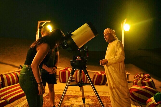 Desert Safari Dubai 30 Mins Quad Bike, Sand Board, Camel Ride BBQ - From Dubai streets to the red sands of Lehbab
