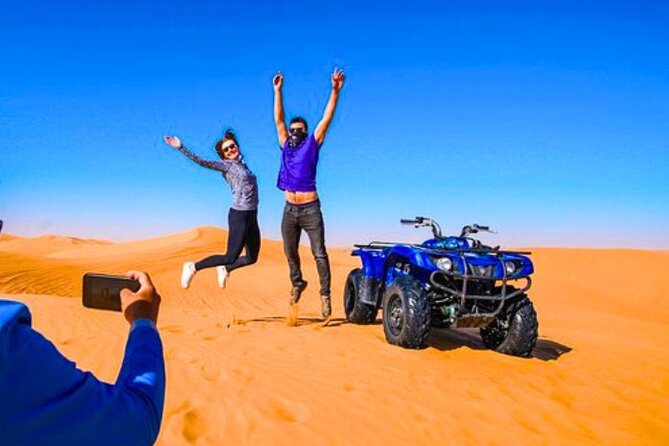Desert Safari Dubai 30 Mins Quad Bike, Sand Board, Camel Ride BBQ - Fire, tanoura, belly dance, and camp entertainment