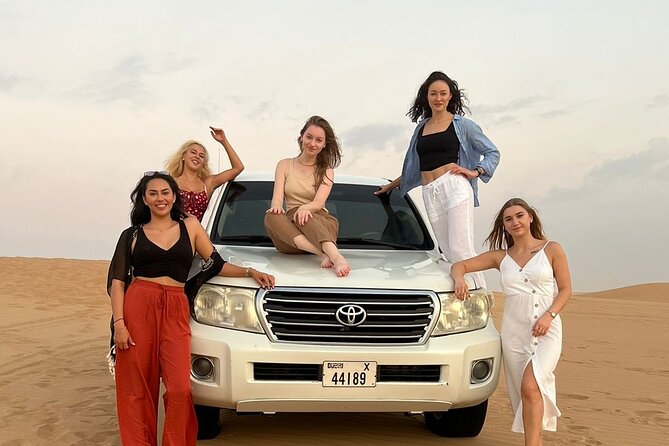 Desert Safari Dubai: 7 Hours Tours With BBQ & Live Shows - Sunset, sand boarding, and the first camp activities